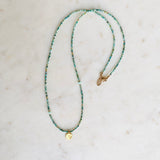 Gold Om Charm Turquoise Necklace