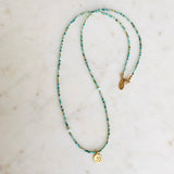 Gold Om Charm Turquoise Necklace