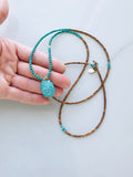 Carved Turquoise Pendant & Sandalwood Necklace