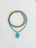 Carved Turquoise Pendant & Sandalwood Necklace