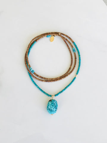 Carved Turquoise Pendant & Sandalwood Necklace