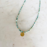 Gold Om Charm Turquoise Necklace